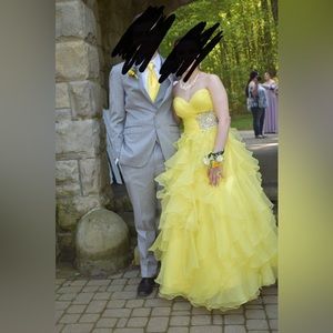 Prom Dress, yellow with some sequences on it. I believe the size is a 5!